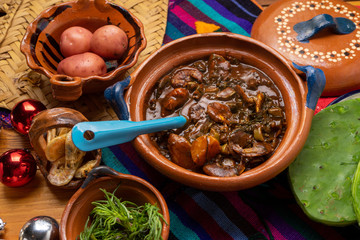 Mexican rosemary with mole sauce and dried shrimps also called 