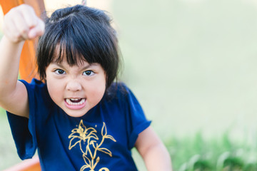 Wall Mural - Emotional Tantrum and Angry little girl in the car.Mad kid got upset and sad and she has a negative attitude.Depressed little girl complaining.Attention deficit hyperactivity disorder (ADHD) Concept.