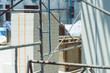 © MIA Studio - Construction site background.Scaffolding or framework for buildings on Cement background.Industrial and under construction concept.