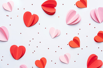 Wall Mural - Valentines Day background with cookies, red and pink hearts on pastel background