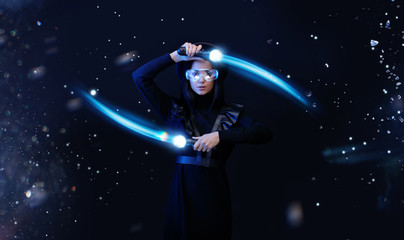 Wall Mural - beautiful woman in futuristic dress over dark space magic background. gamer girl in glasses of virtu