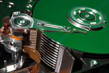 Opened and Exposed Hard Drive Platters in Green