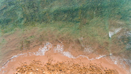 Wall Mural - Aerial View of Waves and Beaches at Sunset Along the Great Ocean Road, Australia