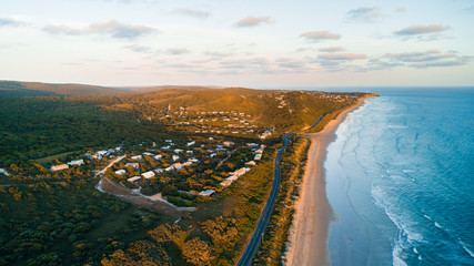 Wall Mural - Aerial View of Waves and Beaches at Sunset Along the Great Ocean Road, Australia