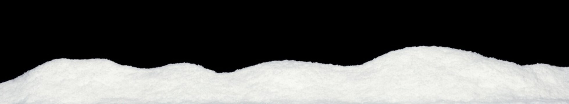 Banner of sparkling fuffy white snow hills isolated on black