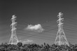 © leeyiutung - Electric pylon and electric line with blue sky background