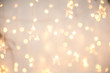© Nelly - Background of New Year's garlands like stars. Christmas atmosphere with garlands in focus and defocus.