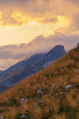 Poster - Summer sunset mountaine landscape with cloudy sky. Mountain scenery, National park Durmitor, Zabljak, Montenegro.