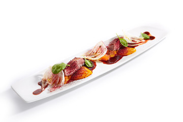 Poster - Duck breast with roasted plum dish closeup