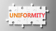 Uniformity complex like a puzzle - pictured as word Uniformity on a puzzle pieces to show that Uniformity can be difficult and needs cooperating pieces that fit together, 3d illustration