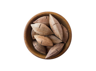 Wall Mural - Studio shot of brazil nuts on white background. Brazil nuts in nutshell on wooden bowl isolated on white.  Brazil nuts with copy space for text. Nuts close-up. Top view.