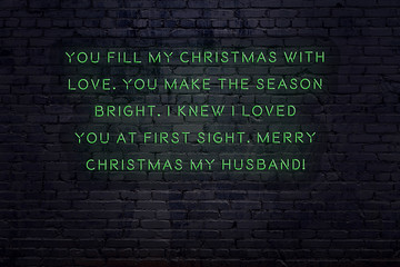 Wall Mural - Neon inscription of christmas and new year greetings on brick wall