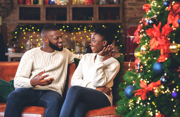 Sticker - Portrait of romantic black couple enjoying spending Christmas time together