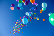 Leinwandbild Motiv Colorful Balloons flying in the sky party