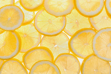 Slices Of Fresh Lemon As Background, Top View