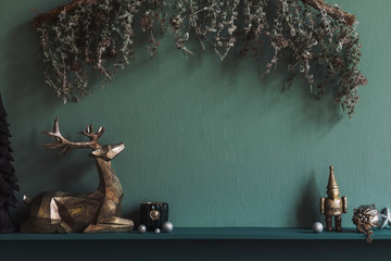 Christmas composition on the shelf in the living room interior. Beautiful decoration. Christmas trees, candles, stars, light and elegant accessories. Merry Christmas and Happy Holidays, Template. 