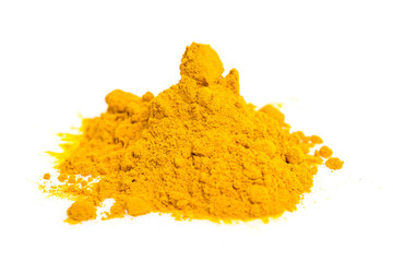 heap of curcuma / turmeric powder isolated on white background