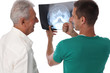 © dream@do - Doctor delivers the good news , Senior Care. Doctor explaining x-ray results to patient