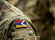 Flag of Artsakh on military uniform. Flag of the Republic of Artsakh and also known as Nagorno-Karabakh Republic on soldiers arm. Army, armed forces, soldiers. Collage.