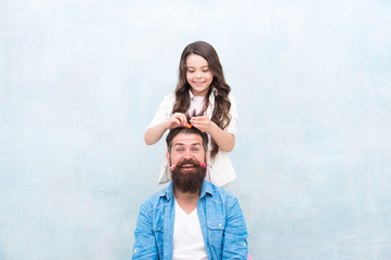 Wall Mural - Daughter style, you smile. Little daughter stylist. Small daughter hairstyle fathers hair. Happy family. Cute hairdresser. Daughter barber did me first. Hair salon. Barbershop