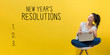 © Tierney - New years resolution with young woman using a laptop computer
