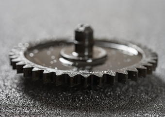 side view cogwheel on dark background