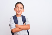 Beautiful Student Kid Boy Wearing Backpack Standing Over Isolated White Background Happy Face Smiling With Crossed Arms Looking At The Camera. Positive Person.