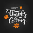 Hand drawn Happy Thanksgiving lettering typography poster. Celebration quote on chalkboard background for postcard, icon, logo, badge. Autumn vector calligraphy text on a dark background