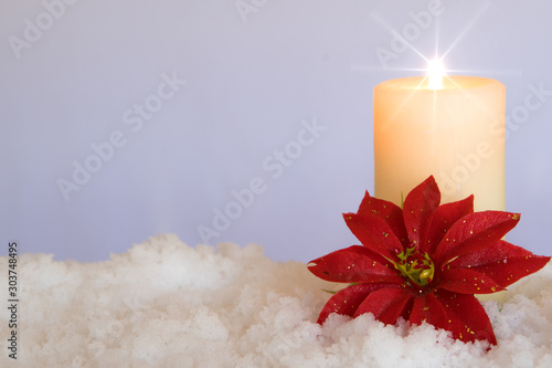 Red Poinsettia Flower With Lit Candle In Snow White Christmas Background With Holiday Theme Buy This Stock Photo And Explore Similar Images At Adobe Stock Adobe Stock