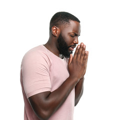 Sticker - Praying African-American man on white background