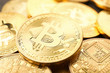 © Pixel-Shot - Many golden bitcoins, closeup view
