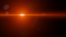 Abstract Hot Orange Lens Flare Effect Overlay Texture With Bokeh Effect And Light Streak In Front Of A Black Background