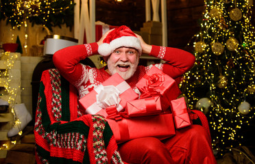 Excitement. happy new year. Secret santa. presents from santa. winter holiday shopping. party celebration. gifts at Christmas tree. Merry christmas. bearded man go shopping. xmas gifts