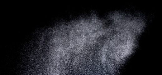 Wall Mural - Texture of a snowstorm isolated on a black background, Clusters of stars in space, dynamic scattering of particles