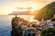canvas print picture - Vernazza - Village of Cinque Terre National Park at Coast of Italy. Beautiful colors at sunset. Province of La Spezia, Liguria, in the north of Italy - Travel destination and attraction in Europe.