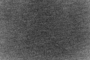 Black jersey fabric texture background.