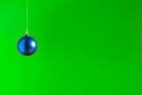 Fototapeta Kuchnia - Christmas composition from a New Year`s ball on a bright colorful unusual background. place for text