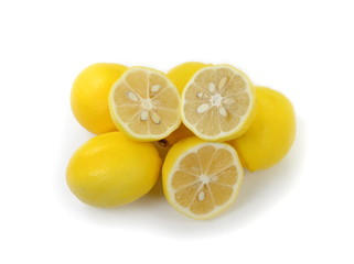 Wall Mural - Heap of lemon. Juicy yellow slice of lemon on a white background isolated. Cut lemon fruits isolated on white background.