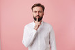 © timtimphoto - young bearded brunette man male guy with short haircut trendy hairstyle dressed in wearing white shirt formal clothes standing posing isolated over pink background