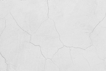 Wall Mural - Rough white relief stucco with cracks wall texture background. blank for designers