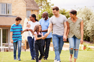 Wall Mural - Smiling Multi-Generation Mixed Race Family In Garden At Home Together