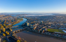 An Aerial View At Sunrise Of Newport City Centre, South Wales United Kingdom, Taken From The River Usk