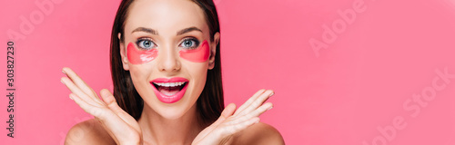 Fotografía surprised naked beautiful woman with eye patch on face isolated on pink, panoram