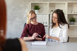 © stock28studio - Two HR's examining CV of candidate at job interview. Selective focus