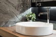 © kitthanes  - Bathroom interior with sink and faucet