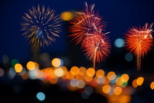 Fireworks Stock Image And Blurred Ferris Wheel