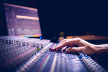 Male Producer, Sound Engineer Hands Working On Audio Mixing Console In Broadcasting, Recording Studio