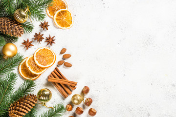 Christmas baking background with spices on white.