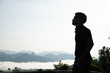 © Arthiti - determined man, explorer pathfinder forest, military man forest, man with tactical gear at the cliff with mountain view, cool guy forest.