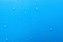 Water Drops On Light Blue Background, Top View